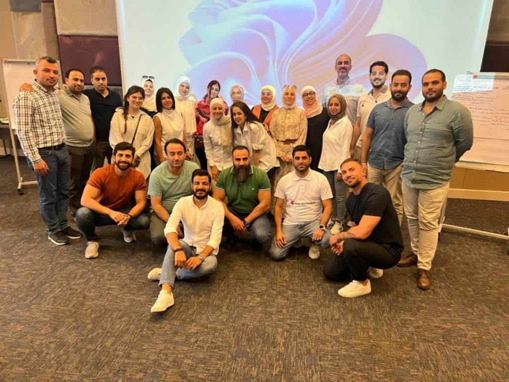 Men and women posing for a group picture